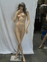 Mannequin posed to wear feminine clothing